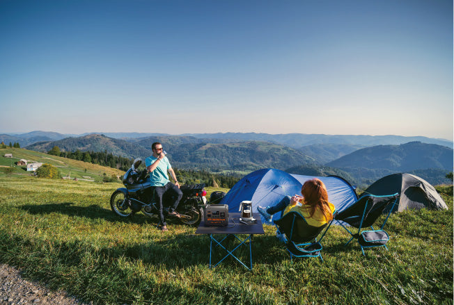 BLUETTI AC50P in use outdoors charging devices