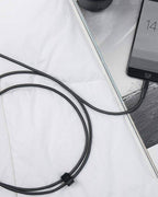 Anker PowerLine+ II cable charging iPhone on desk