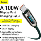 Baseus 100W green cable charging laptop with wattage shown