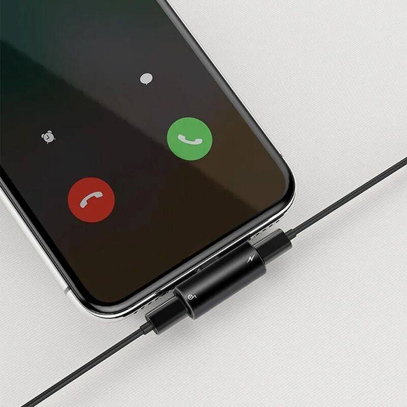 Baseus L46 Lightning splitter connected to iPhone with headphones and charger