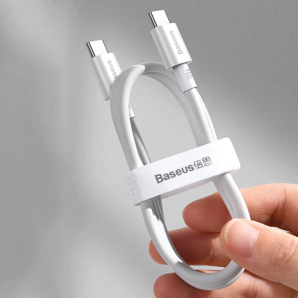 Baseus 100W white USB-C cable connected to MacBook for fast charging