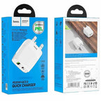 Hoco C85B charger plugged into wall socket