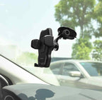 Hoco CA31 car holder mounted on dashboard with phone