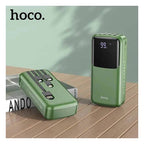 Hoco DB07A power bank charging multiple devices