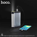 Hoco DB14 jump starter jump-starting a car