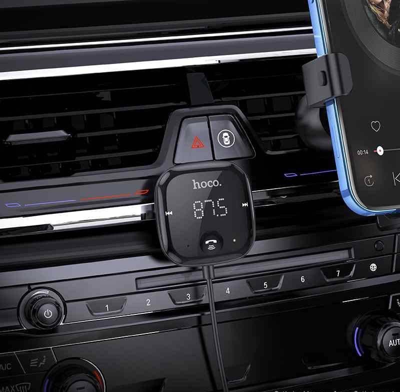 Hoco E65 FM transmitter plugged into car with display