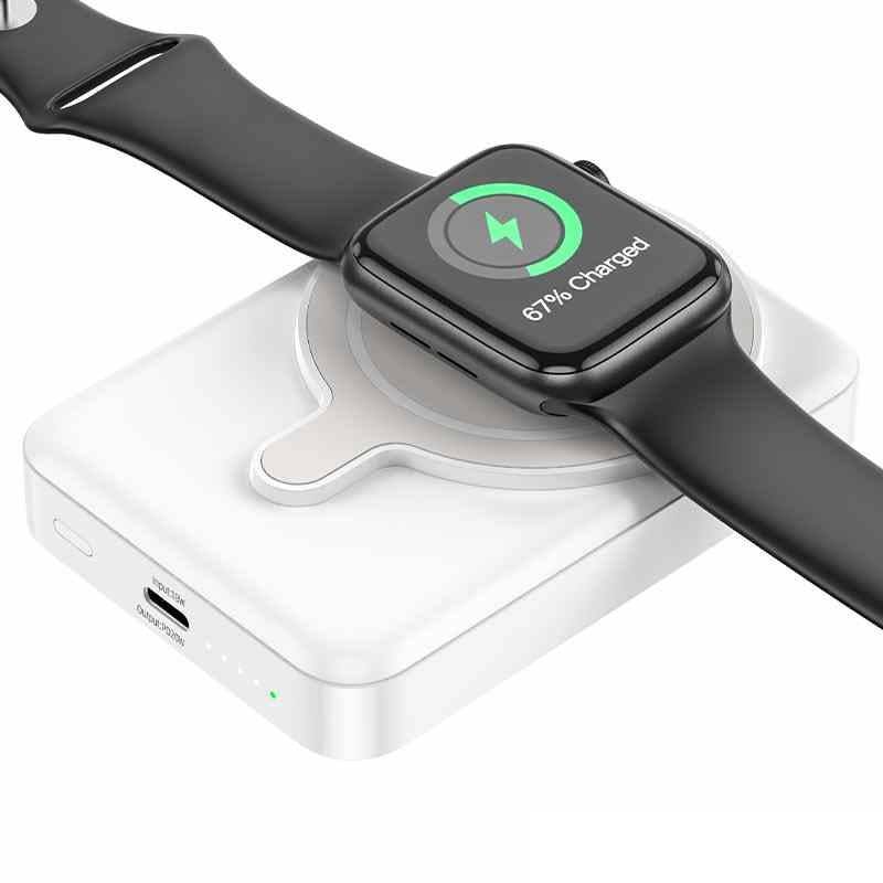 Hoco Q11 wireless power bank charging iPhone on Qi pad
