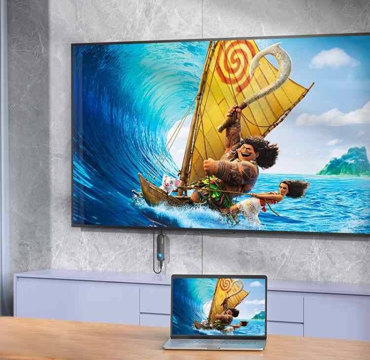Hoco UA23 wireless projector adapter connected to iPhone and TV