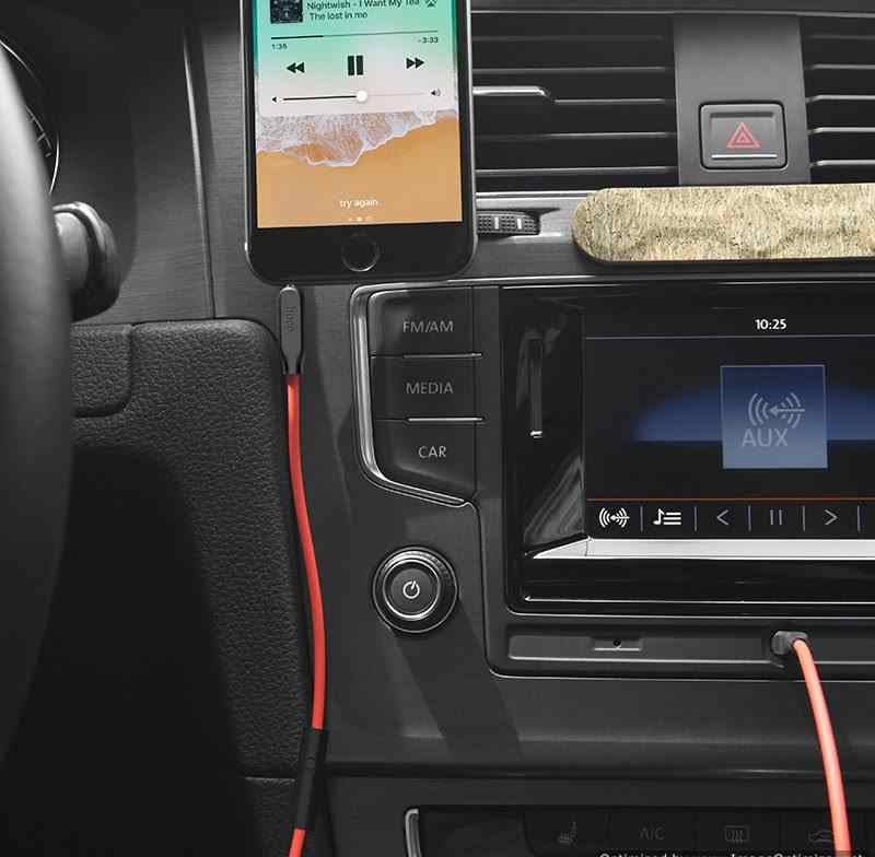 Hoco UPA12 3.5mm AUX cable connected to phone and speaker