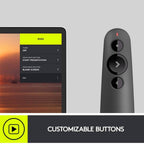 Logitech R500s wireless remote held in hand during presentation