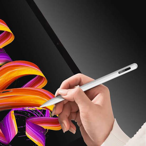 Powerology digital stylus held in hand for note taking